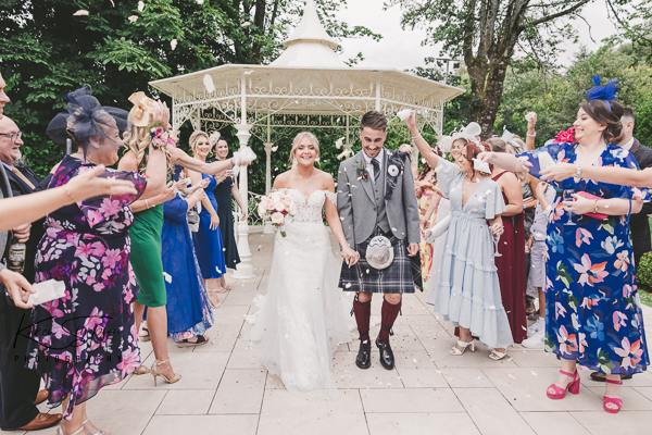 Dalmeny-Park-Glasgow-Scotland (7 of 20) Bride and groom walking through confetti at Dalmeny Park
