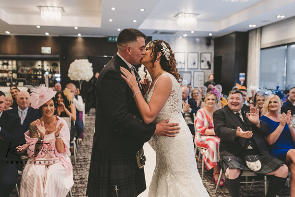 Rowallan-Castle-Glasshouse-Glasgow (4 of 8) Bride and groom kissing in ceremony room