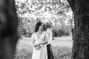 Couple in the blossoms at The kay park in Kilmarnock