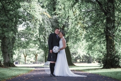 Bride, groom, kilts, tattoo bride