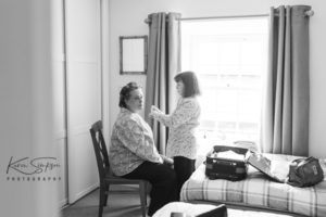 Sister doing brides makeup