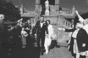 Confetti shot, bride and groom black and white