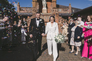 Confetti shot, bride and groom black and white