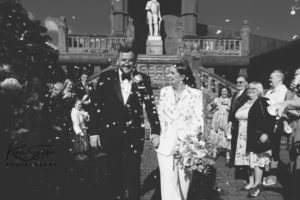 Confetti shot, bride and groom black and white