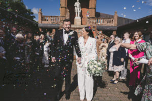 Confetti shot, bride and groom black and white