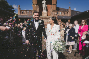 Confetti shot, bride and groom black and white